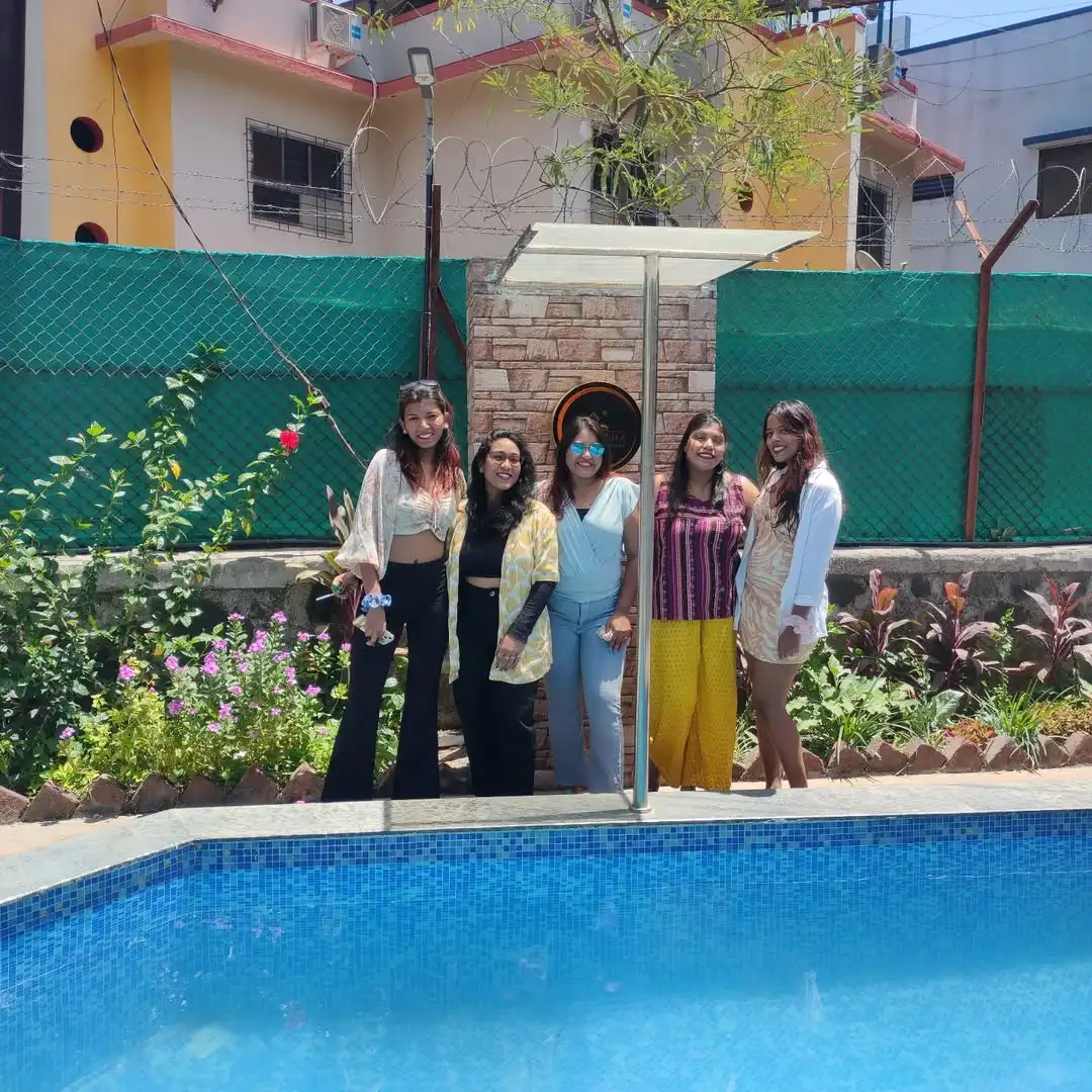 Joyful guests having fun at Govind Villa's outdoor area